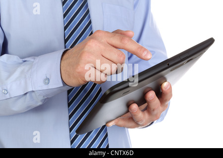 Business man working on digital tablet Stock Photo