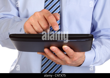 Business man working on digital tablet Stock Photo