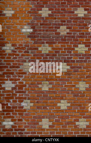 A set of bricks with a cross pattern at an old building in Vienna Stock Photo