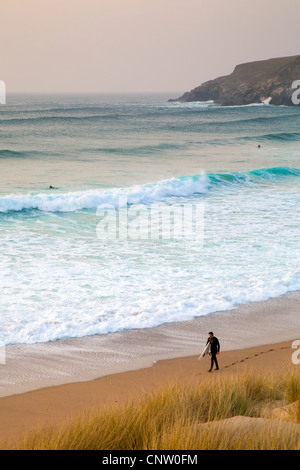 Holywell Bay; surfer; Cornwall; UK Stock Photo