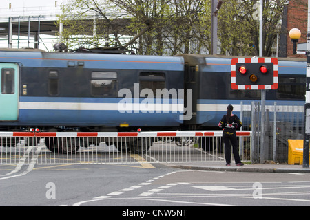 Highams Park Station level crossing, north east London uk Stock Photo