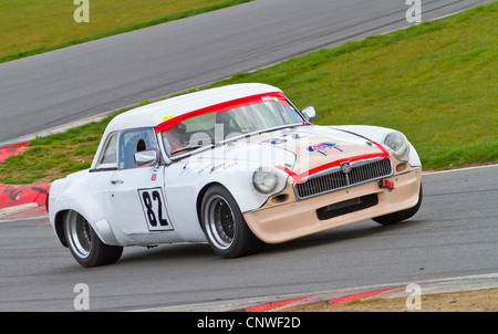 1974 MGB V8 with driver Andrew Riley during the CSCC HVRA V8 race at Snetterton, Norfolk, UK. Stock Photo