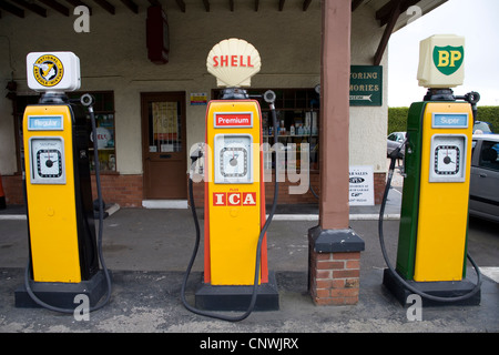 Old fashioned Shell & BP Petrol pumps Stock Photo