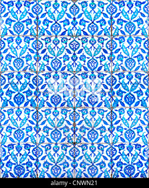 A seamless background image of ancient hand painted ceramic tiles from an islamic mosque. Stock Photo