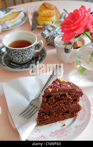 Chocolate Sponge Cake at Afternoon Tea - High Tea of Highgate tea shop, London, England, UK Stock Photo