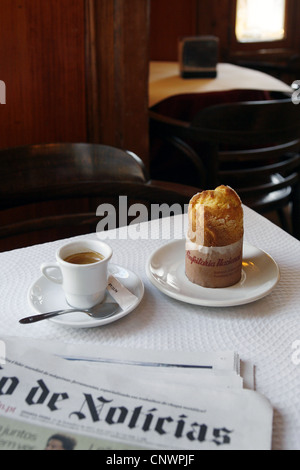 Coffee and a Bolo de Arroz (Portuguese Rice Muffin), Confeitaria Nacional Confectionary, Praça da Figueira, Lisbon, Portugal Stock Photo