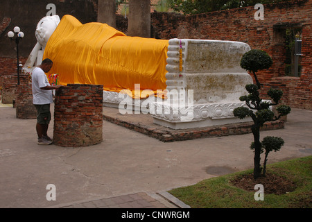 Reclining Buddha in Wat Yai Chai Mongkon in Ayutthaya, Thailand. Stock Photo