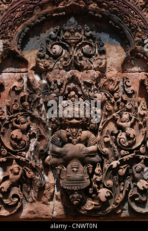 Demon seizes Sita, the consort of Hindu god Rama. Relief from the Banteay Srei Temple in Angkor, Cambodia. Stock Photo