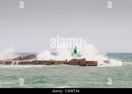 breakwaters with beacon in stormy surge, France, Languedoc-Roussillon, Ste Stock Photo