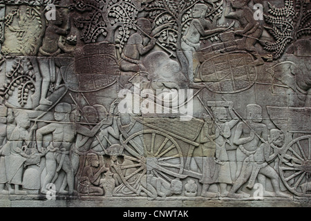 Khmer peasants harvest. Relief from Bayon Temple in Angkor, Cambodia. Stock Photo