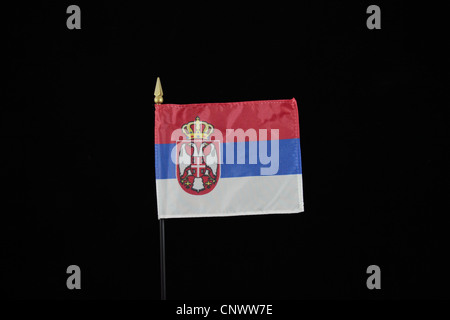 The national flag of Serbia on a black background. Stock Photo