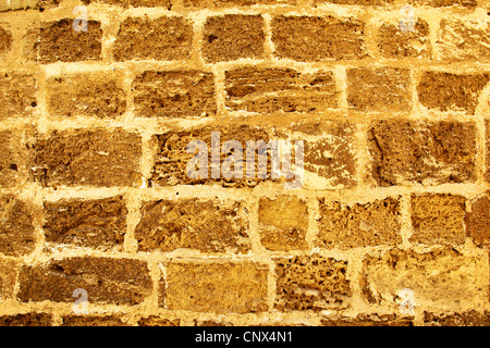 Wall made from sandstone bricks, may be used as background Stock Photo