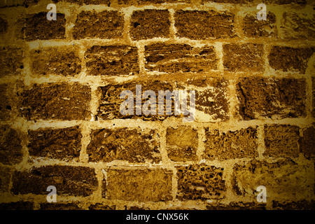 Wall made from sandstone bricks, may be used as background Stock Photo