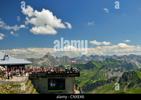 tourists at mountain station of Nebelhornbahn at Nebelhorn 2224 m, Hochvogel 2592 m in the background, Germany, Bavaria, Allgaeu Alps Stock Photo