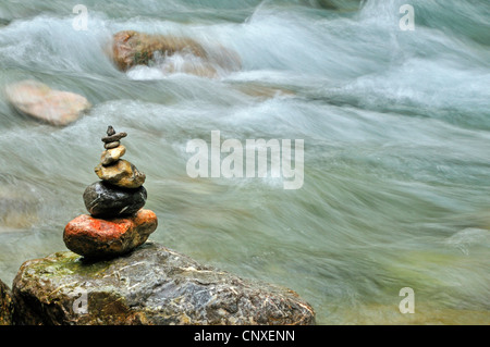 pile of stones at the creek in Oy Valley, Oytal, in Allgaeu, Germany, Bavaria, Allgaeu Alps, Allgaeu Stock Photo