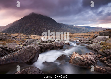 Rocky river flowing through mountains, Snowdonia, Wales, UK. Spring (April) 2011. Stock Photo