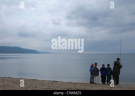 Children fishing on Lake Baikal, Siberia, Russia. Stock Photo