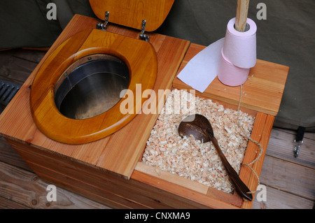 Ecological dry toilet with sawdust compost in lodge tent, Rhodes animal's park, Moselle, France, Europe Stock Photo