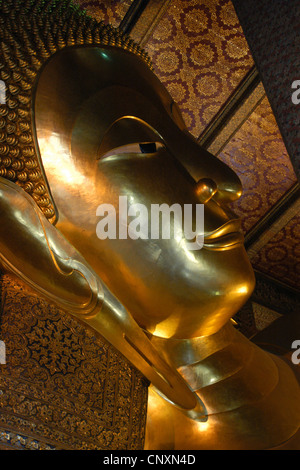 Reclining Buddha in Wat Po in Bangkok, Thailand. Stock Photo