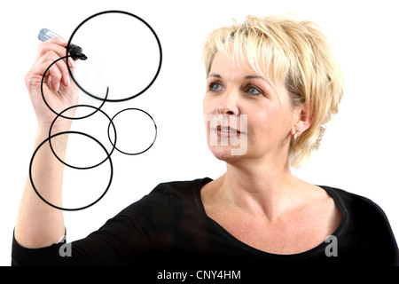 Woman is drawing a mind map. Organize scheme, organization structure. Stock Photo