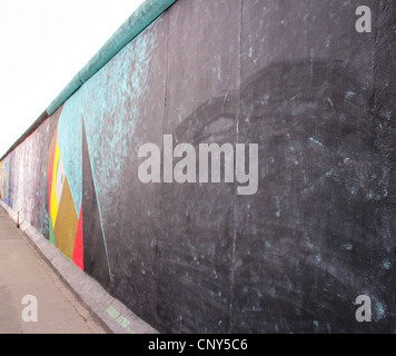 The East Side Gallery's murales are the street-art in Berlin, painted on their own famous wall Stock Photo