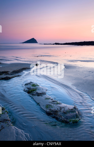 Wembury Bay and the Great Mewstone at sunset, Wembury, Devon, England. Spring (April) 2009 Stock Photo