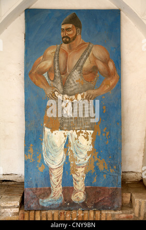 Portrait of Uzbek national hero Pakhlavan Mahmud in the Handicraft Centre in Khiva, Uzbekistan. Stock Photo