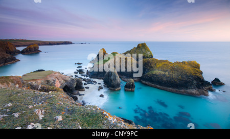 Twilight over Kynance Cove on the Lizard Peninsula, Cornwall, England. Spring (April) 2010. Stock Photo