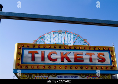 Tickets sign with Wonder Wheel in the background. Stock Photo