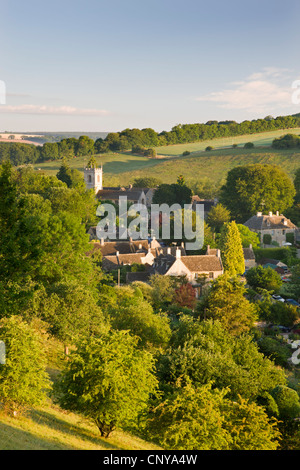 Cottages nestled into the valley in the picturesque Cotswolds village of Naunton, Gloucestershire, England. Summer (July) 2010. Stock Photo