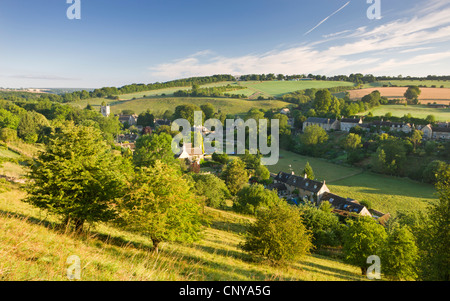 Cottages nestled into the valley in the picturesque Cotswolds village of Naunton, Gloucestershire, England. Summer (July) 2010. Stock Photo