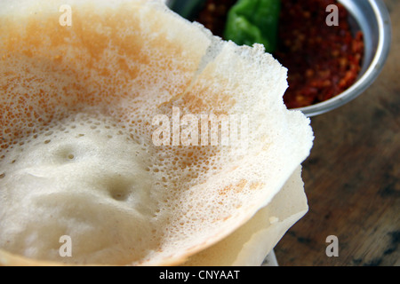 Sri Lanka hoppers with chili sambol Stock Photo