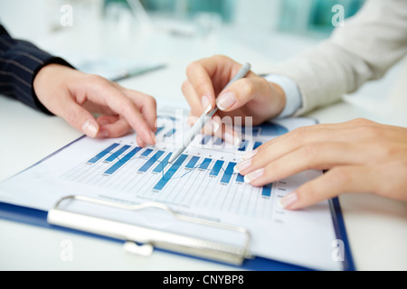 Close-up shot of business graphs indicating corporate progress Stock Photo