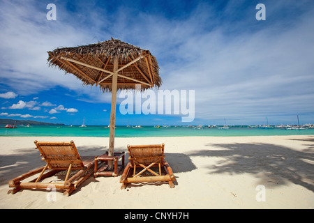 two canvas chairs and sunshade on sandy beach, Philippines, Boracay Stock Photo