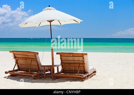 two canvas chairs and sunshade on sandy beach, Philippines, Boracay Stock Photo