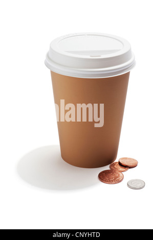 A takeaway drink cup with British coins by the side Stock Photo