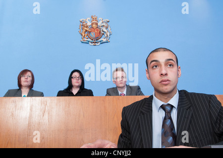 Clerk of the Court sits in front of Magistrates Stock Photo