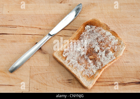 One slice of buttered toast Stock Photo