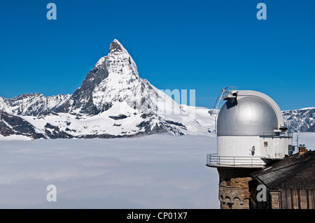 observatory at summit of Gronergrat, Matterhorn in background, Switzerland Stock Photo