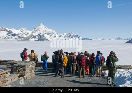 tourists on Gornergrat summit, Matterhorn in background, Switzerland Stock Photo