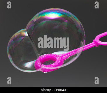 Bubbles on a plastic blower Stock Photo