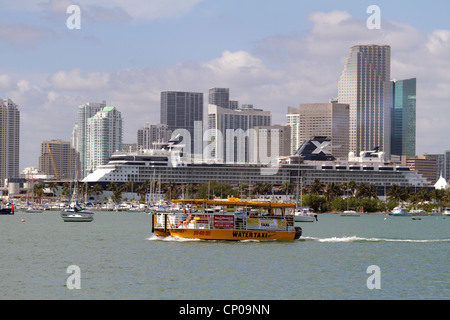 Miami Florida,Biscayne Bay,Celebrity Millennium. cruise ship,Celebrity Cruises,Port of Miami,downtown city skyline,office buildings,city skyline,hotel Stock Photo