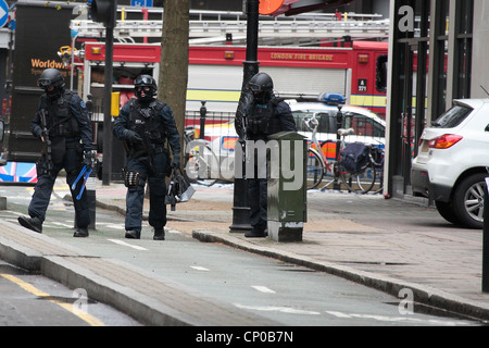 Specialist Firearms Officers from the Met Police at the scene of a ...