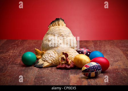 Hen With Colored Eggs Stock Photo