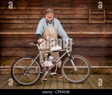 Jeff, motorized bicycle builder, at Deer Harbor, Orcas Island, Washington. Stock Photo