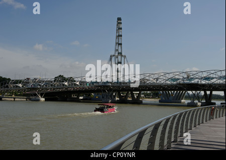 The Helix  suspension bridge and the Flyer, Marina Bay, Singapore. Stock Photo