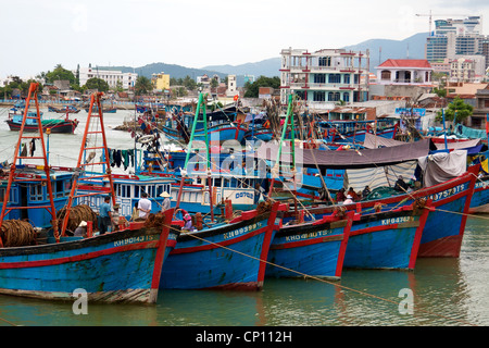 Fishing boats in the harbour in Nha Trang, Vietnam. Stock Photo