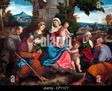 Holy Family Saints Francis Anthony Magdalene John the Baptist  Elizabeth 1533 Bonifacio de 'Pitati - Bonifacio Veronese  Italia Stock Photo