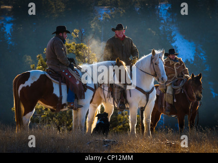 Cowboys on horseback in northeastern Wyoming Stock Photo