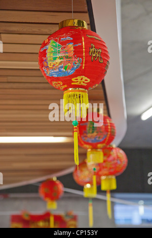 A row of hanging Chinese lanterns on display during a celebration of the 2012 Chinese Lunar New Year. Stock Photo